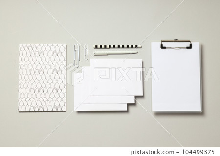 Mockup flat lay with business accessories on light gray background 104499375