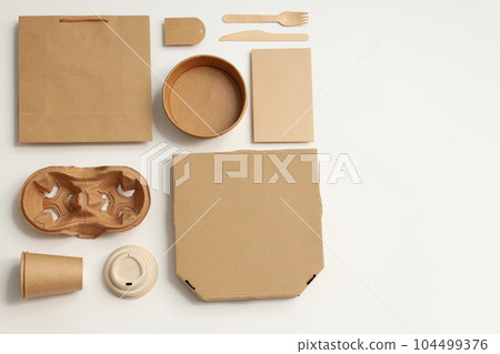 Disposable blank tableware for food delivery on white background 104499376