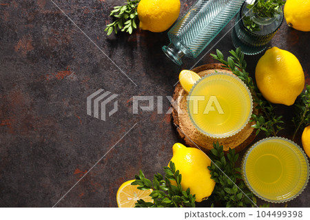 Concept of fresh summer drink - Limoncello cocktail Concept of fresh summer drink - Limoncello cocktail 104499398