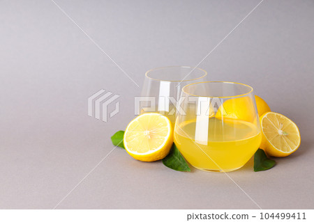 Concept of fresh summer drink - Limoncello cocktail Concept of fresh summer drink - Limoncello cocktail 104499411
