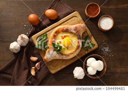 National Georgian cuisine food, flour product - Khachapuri 104499481