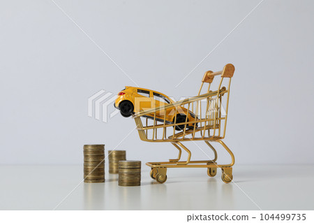 Concept of buying a car with toy car 104499735