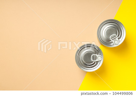 Canned food in blank metal jars, concept of canned food Canned food in blank metal jars, concept of canned food 104499806