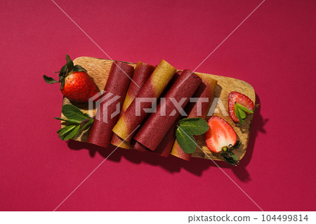 Concept of tasty and sweet food - pastille 104499814