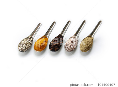 Spice and herbs in steel spoon are on wooden background. Displayed for the nutrients healthy banner. Spice and herbs in steel spoon are on wooden background. Displayed for the nutrients healthy banner. 104500407