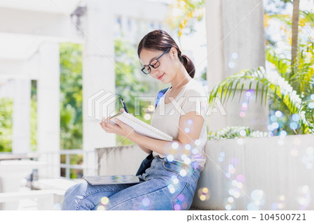 University teen girl happy smiling enjoy learning education. young woman with diary note pocket book 104500721