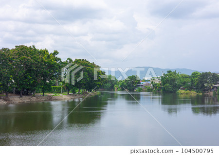 Lampang Wang River , beautiful nature landscape of irrigation water canal in Northern Lampang province in Thailand. 104500795