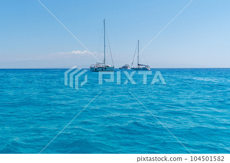 Beautiful seascape with sailing yachts in summer on sunny day aerial view. Travel concept Beautiful seascape with sailing yachts in summer on sunny day aerial view. Travel concept 104501582