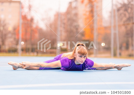 Morning sport warm up stretching balance. Hispanic mid female argentinian acrobat in sportwear. Morning sport warm up stretching balance. Hispanic mid female argentinian acrobat in sportwear. 104501800