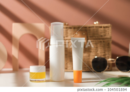mock up skincare and suncare packaging including bottle, tube, and jar. summer beauty and fashion concept. 104501894