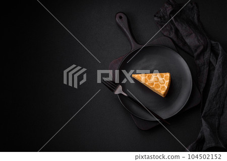 Delicious fresh sweet honey cake layer cake with white cream 104502152