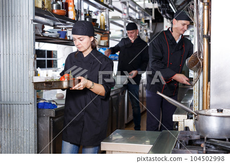 Positive cooks in process of working Positive cooks in process of working 104502998