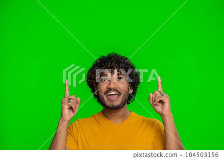 Indian man showing thumbs up pointing empty place, advertising area for commercial text, copy space Indian man showing thumbs up pointing empty place, advertising area for commercial text, copy space 104503156