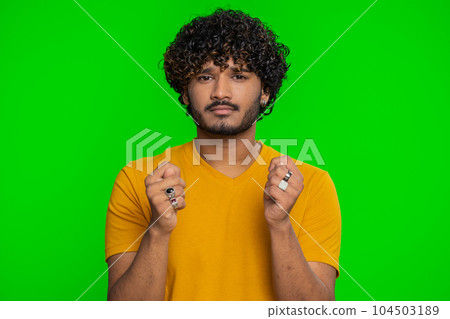 Quarrel, indian man showing fig negative gesture, rapacious, avaricious, acquisitive, refusal sign 104503189