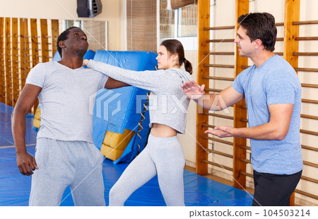 People fighting with coach at gym People fighting with coach at gym 104503214