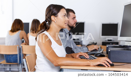 Female student working on computer 104503414