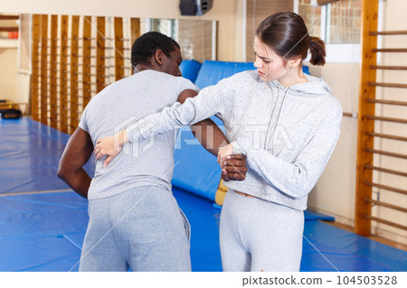 People fighting with coach at gym People fighting with coach at gym 104503528