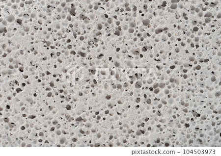 Hard porous scrub texture background Hard porous scrub texture background 104503973