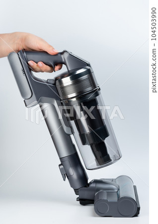 Cleaning floor with vacuum cleaner sweep brush Cleaning floor with vacuum cleaner sweep brush 104503990