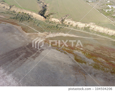 View of the pink salty Syvash lake in Kherson region, Ukraine 104504206