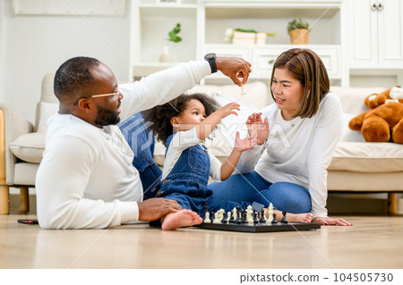 Happy family spending time together at home Happy family spending time together at home 104505730