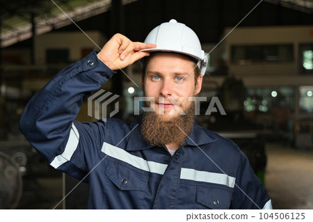 Mechanical engineer repairing engine machine at factory Mechanical engineer repairing engine machine at factory 104506125