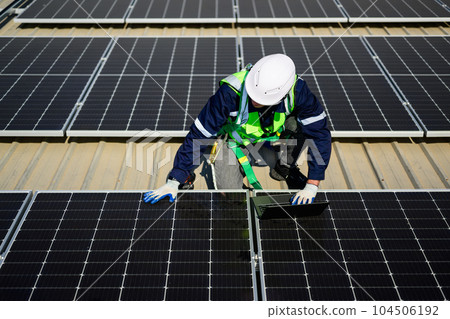 Professional engineer technician with safety helmet checking system Professional engineer technician with safety helmet checking system 104506192