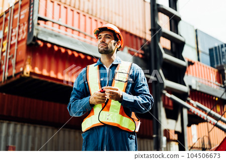 Warehouse engineer worker working at industrial container yard 104506673