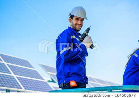 Solar panel station, Engineer installing solar panel at solar energy farm field Solar panel station, Engineer installing solar panel at solar energy farm field 104506677