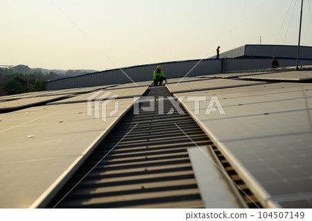 Solar panels on rooftop, Photovoltaic modules for renewable energy 104507149