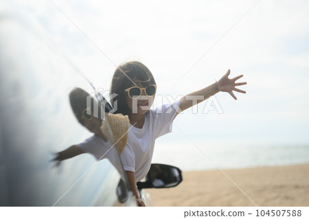 Happy Asian family travel on beach on holiday 104507588