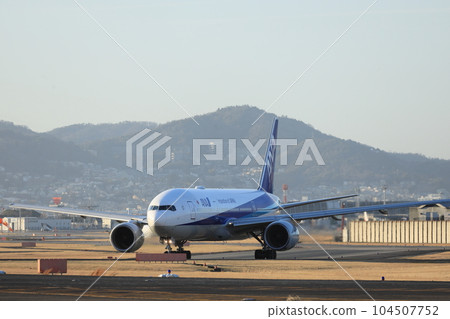Takeoff and landing at Osaka Itami Airport Takeoff and landing at Osaka Itami Airport 104507752