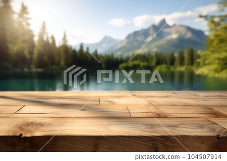 The empty wooden table top with blur background of summer lakes mountain. Exuberant. 104507914