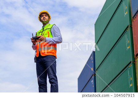Warehouse engineer worker working at industrial container yard Warehouse engineer worker working at industrial container yard 104507915