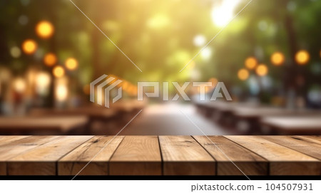 The empty wooden table top with blur background of outdoor cafe. Exuberant. The empty wooden table top with blur background of outdoor cafe. Exuberant. 104507931