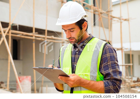 Portrait of cvil engineer with safety uniform working at construction site outdoor, Construction worker checking and controlling project on building site, Architecture engineering on new project Portrait of cvil engineer with safety uniform working at construction site outdoor, Construction worker checking and controlling project on building site, Architecture engineering on new project 104508154