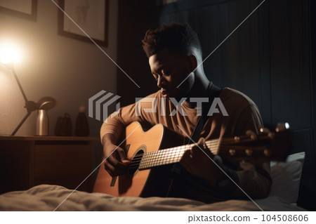 Male African 20s playing guitar in bedroom activity music. Generative AI AIG23. Male African 20s playing guitar in bedroom activity music. Generative AI AIG23. 104508606