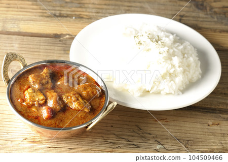 Hot spicy Indian curry with chicken and rice Hot spicy Indian curry with chicken and rice 104509466