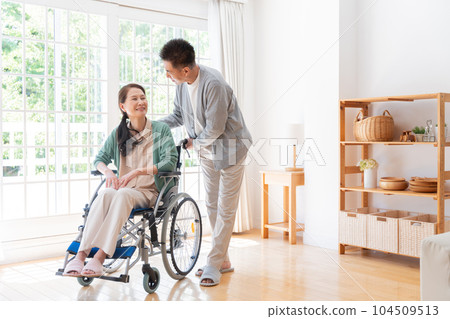 Husband who cares for his wife at home (senior, elderly, couple) 104509513