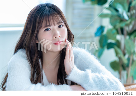 Young woman suffering from face care Young woman suffering from face care 104510031