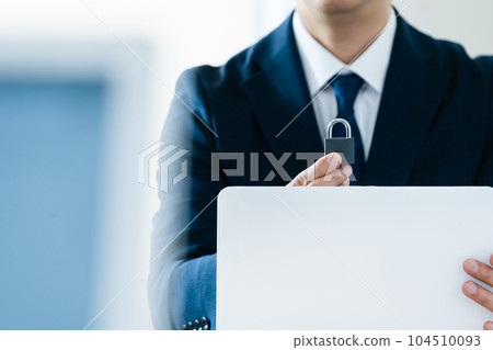 Businessman with key Businessman with key 104510093