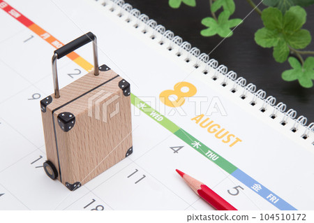 August calendar and suitcase August calendar and suitcase 104510172