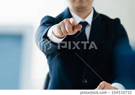 A businessman who points out 104510732
