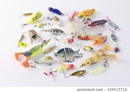 Various fishing lures on a white background Various fishing lures on a white background 104513718