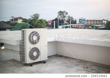 Air conditioner compressor outdoor unit installed outside the building Air conditioner compressor outdoor unit installed outside the building 104514081