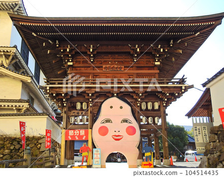 Giant Otafuku at Yasaka Shrine Tower Gate next to Kokura Castle in Kitakyushu City 104514435