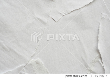 Blank white torn damaged paper poster texture background 104514893