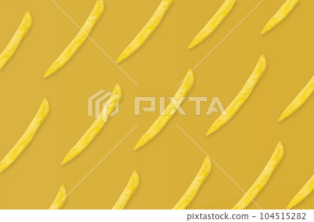 french fries pattern on yellow background top view flat lay french fries pattern on yellow background top view flat lay 104515282