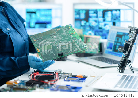 Engineer inspecting the board Engineer inspecting the board 104515413