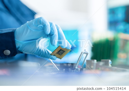 Engineer inspecting the board 104515414